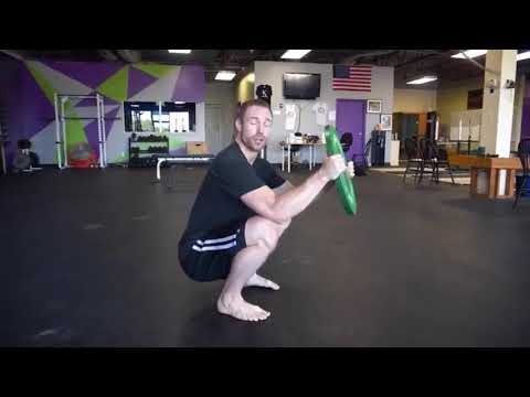 Goblet squat ankle stretch